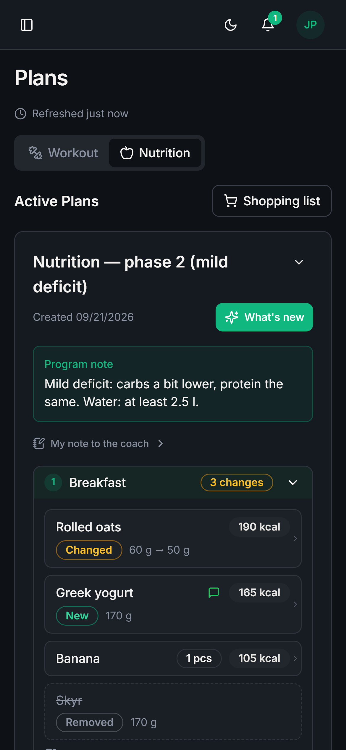 The client’s nutrition plan on a phone with “What’s new” on: added, removed and changed foods.